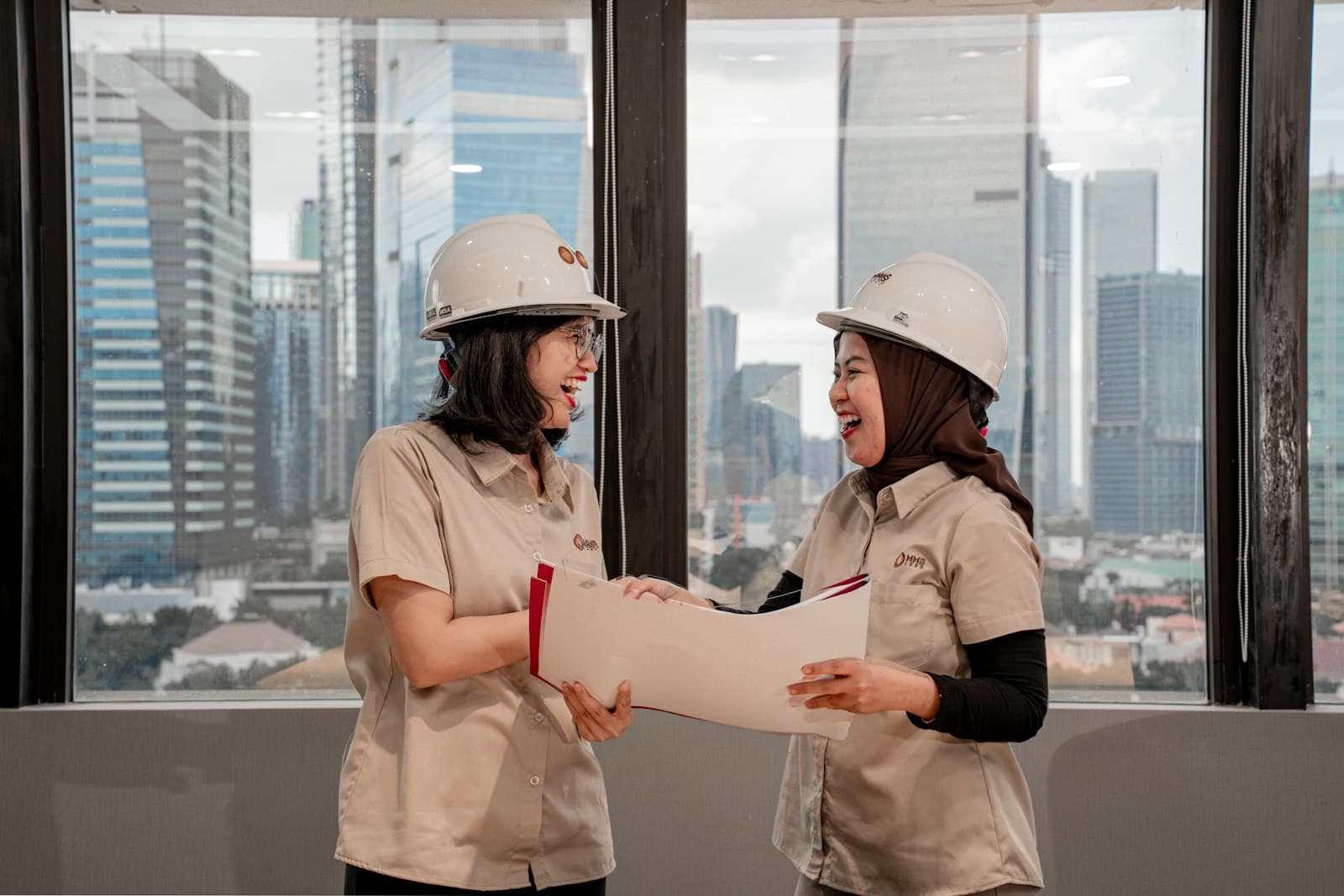 Q Axis engineers reviewing site plans